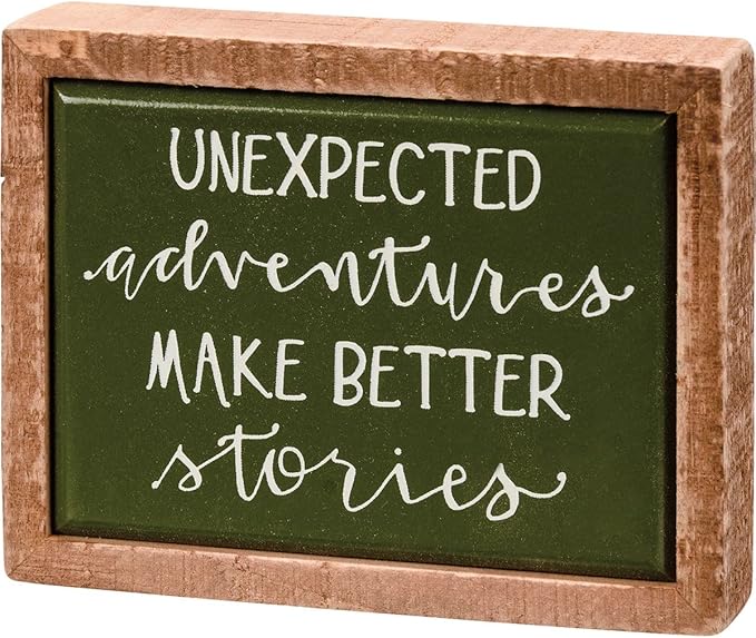 Unexpected Adventures Make Better Stories sign
